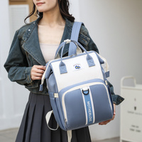 Green New Large Capacity Mommy Bag – Portable and Lightweight Multi-Function Diaper Backpack, Stylish Baby and Mom Storage Bag thumbnail