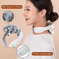 White Portable Electric Neck Massager – Intelligent Pulse Therapy with Heat and 4 Massage Heads thumbnail