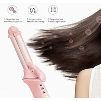 Red Mini Cordless Hair Curler with Adjustable Heat Settings and USB Charging thumbnail