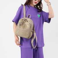 Apricot Mini Nylon Multi-Compartment Backpack - Lightweight and Stylish Everyday Bag thumbnail