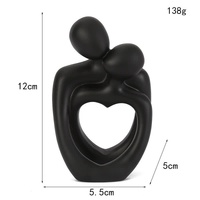 Black Romantic Couple Figurine with Heart Design - Modern Minimalist Decorative Statue thumbnail