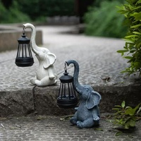 White Meditating Elephant Solar Lantern Statue - Decorative Garden Light for Outdoor Spaces thumbnail