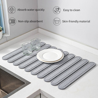 Dark Gray Oval Shaped Engraved Inner Frame Foldable Diatomaceous Earth Drying Mat - Super Absorbent, Fast-Drying, Non-Slip Kitchen Countertop Mat thumbnail