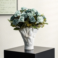 Elegant white vintage ceramic vase - decorative home accessories with floral details thumbnail