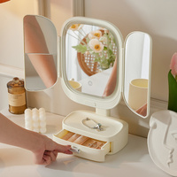 White LED Lighted Tri-Fold Makeup Mirror with Storage Drawer & Magnification(USB Charging Port) thumbnail