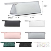 Emerald Green Hair Dryer Storage Package with Protective Cover and Hair Roll thumbnail