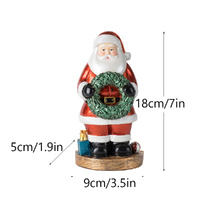 Santa Claus Figurine with Wreath - 18cm Festive Resin Christmas Decoration thumbnail