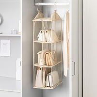 Grey Hanging Dustproof Storage Bag - Multi-Layer Organizer for Bags, Clothes & Accessories, 4-Tier Non-Woven Fabric thumbnail