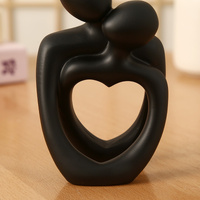 Black Romantic Couple Figurine with Heart Design - Modern Minimalist Decorative Statue thumbnail