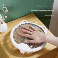 Pink 4-in-1 Foldable Electric Mosquito Swatter - Rechargeable Bug Zapper with UV Light thumbnail