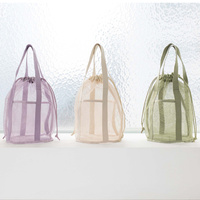 Green Lightweight Mesh Drawstring Beach Bag - Portable Travel Organizer for Toiletries and Essentials thumbnail