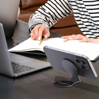 Black Magnetic Foldable Phone Stand – Universal Aluminum Alloy Desktop & Tesla Car Mount, Compact and Lightweight Design thumbnail