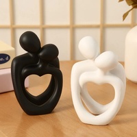 Black Romantic Couple Figurine with Heart Design - Modern Minimalist Decorative Statue thumbnail