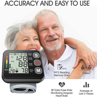Black Compact Digital Wrist Blood Pressure Monitor with Adjustable Arm Cuff thumbnail
