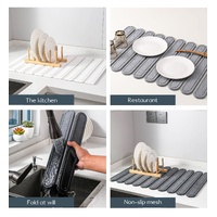 Light Gray Oval Shaped Engraved Inner Frame Foldable Diatomaceous Earth Drying Mat - Super Absorbent, Fast-Drying, Non-Slip Kitchen Countertop Mat thumbnail