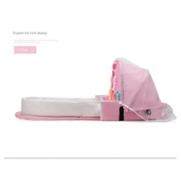 Pink Portable Multi-Purpose Baby Bed and Diaper Backpack - Lightweight, Waterproof, Canvas + Polyester Material, Travel Essential for Moms(With mosqui thumbnail