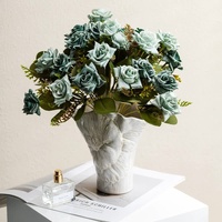 Elegant white vintage ceramic vase - decorative home accessories with floral details thumbnail