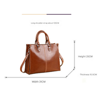 Brown Elegant Leather Handbag - Stylish Brown Tote with Adjustable Strap, Spacious and Durable thumbnail
