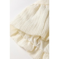 White Textured Bow Ties Front Bubble Hem Puff Short Sleeve Blouse - L thumbnail