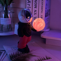 Holding the dreamy starry sky (black top + red pants) Creative Astronaut Bluetooth Speaker with 3D Starry Sky Lighting, Portable Wireless Moon Lamp Sp