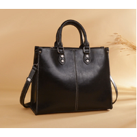 Black Elegant Leather Handbag - Stylish Brown Tote with Adjustable Strap, Spacious and Durable