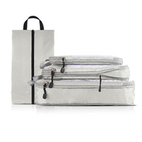 4-piece Set Off White Compression Travel Storage Bags Set, Mesh Travel Organizers for Luggage, Foldable and Space-Saving Packing Cubes