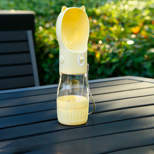 Yellow Portable Dog Water Bottle with Built-in Bowl Dispenser - 250ml Water,180ml Food Capacity, Leak-proof for Travel and Walks - Main Image
