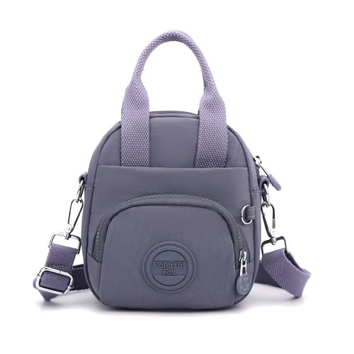 Purple Mini Waterproof Nylon Backpack - Lightweight Casual Crossbody Bag - Main Image