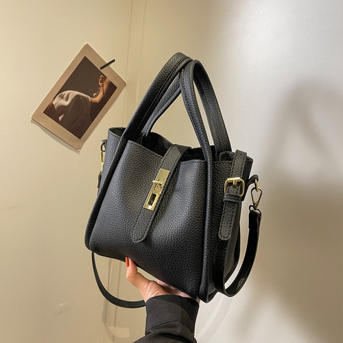 Black Elegant Leather Shoulder Bag - Compact Handbag with Adjustable Strap - Main Image